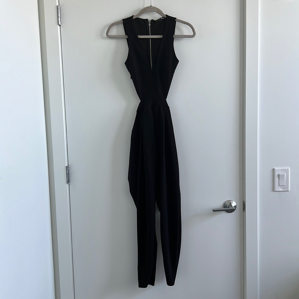 Fashion Nova black side cutout open back tapered leg jumpsuit exposed zipper